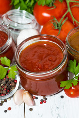 assortment of tomato sauces and ingredients, vertical