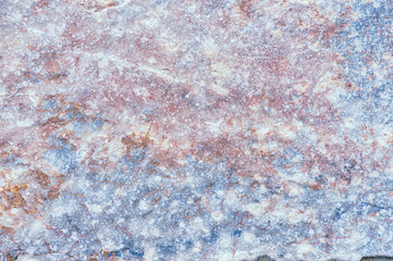 Stone texture. Stone old wall. Granite natural surface. Texture pattern. Natural stone close-up. Structural surface close-up.