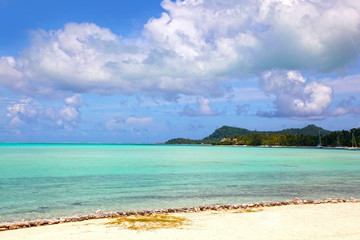 Fototapeta na wymiar Beautiful landscape with the beach & islands in the background, Bora Bora, French Polynesia.