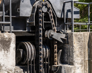 Powerful gears and chains to raise the lock gates at the Barragem do Pocinho dam on the Douro river