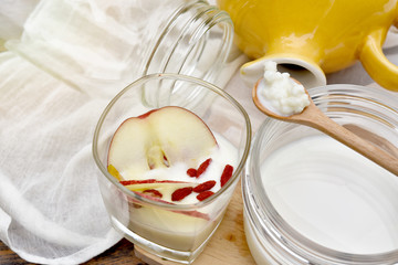 Healthy breakfast food, Kefir grains on wooden spoon, Organic fermented food, Probiotics nutrition drink for good balance digestive system.