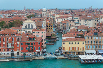 Fototapeta na wymiar Aerial view of typical Venice canal, Italy. Concept: historic Italian places, evocative and little-known views of Venice