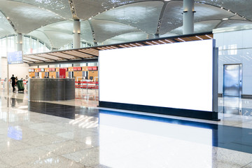 Blank advertising billboard in the Airport, blank billboards public commercial with plane passengers.