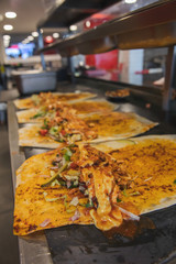 Traditional Turkish Doner Kebab meat. Shawarma or gyros. Turkish, greek or middle eastern arab style chicken doner kebab food in restaurant.