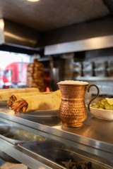 Traditional Turkish Doner Kebab meat. Shawarma or gyros. Turkish, greek or middle eastern arab style chicken doner kebab food in restaurant.