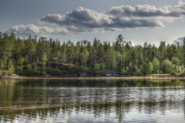 HDR shot with tone mapping effect at the stream Skelleftealven in Vasterbotten, Sweden