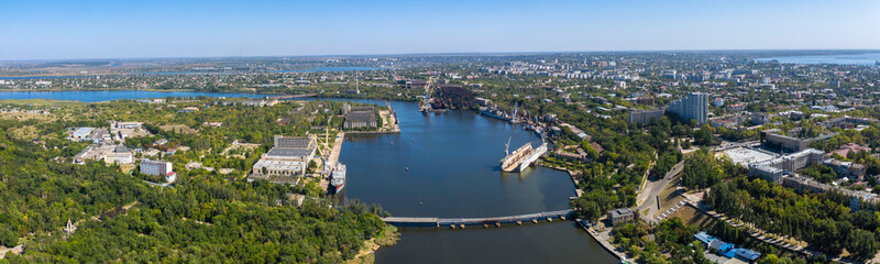 Fototapeta na wymiar Aerial panorama view of Dock for Repair of Ships and Boats in Nikolaev. The Nikolaev city panorama.