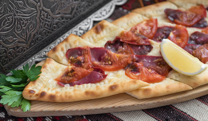 Turkish Pide with Meat, Cheese and Tomato