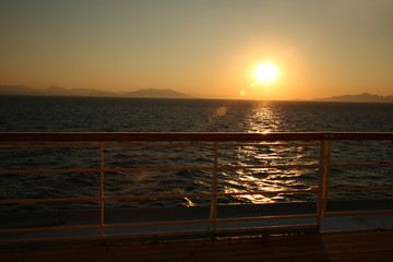 Sunset from the deck of a cruise ship, cruising the Mediteranean Sea.