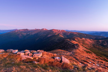 The road to the mountain ranges. Morning in the mountains. Mountain landscape.