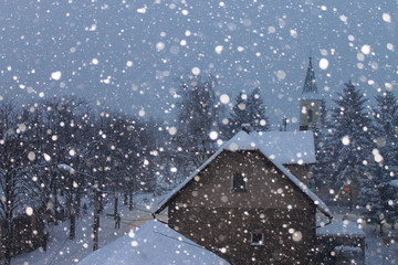 Fototapeta premium Snowy december night in town