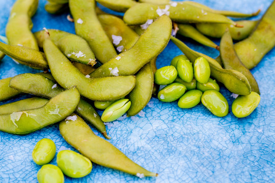 Edamame Peas And Pods On A Turquoise Plate