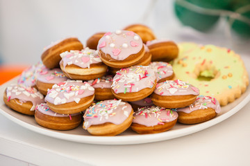 sprinkled shaped cookies on a plate