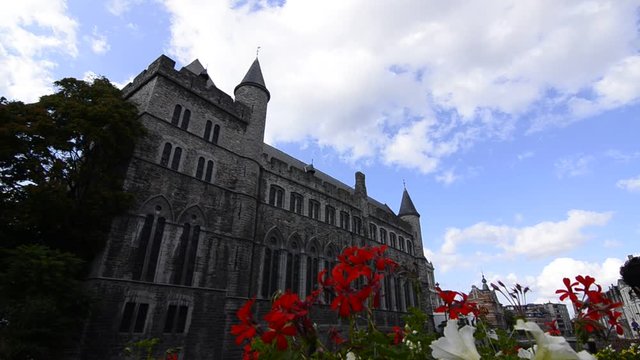 Ghent, Flanders, Belgium. August 2019. The graceful Castle Of Gerald the Devil. The flowers frame the castle.
