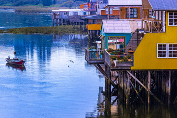 Fototapeta na wymiar Castro, Chiloe Island, Chile - Evening View of Stilt Houses (Palafitos) in Castro
