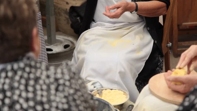 Kneading pita bread, detail of artisan cornbread