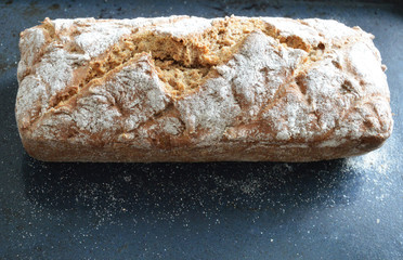 Handmade bread. Homemade cake. Black bread. bakery. Cooking. Oven. Kitchen. Meal. Bread recipe.