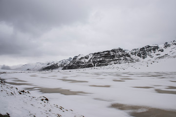 winter landscape with mountains and clouds