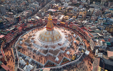 Aerial view on streets of Kathmandu and a stupa of Boudnath is created in the form of a Buddhist mandala. Nepal, shooting from the drone