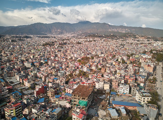 Aerial view on streets of Kathmandu near of Boudhanath is created in the form of a Buddhist mandala. Nepal, shooting from the drone.