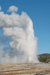 Old Faithful Erupting At Yellowstone National Park