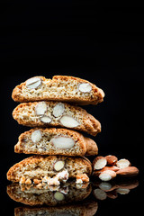 Italian Traditional Almond Biscuits Cantucci. Studio Shot on Black Background