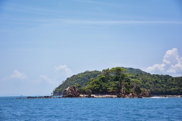 Island, Ocean views near Phuket Thailand with Blues, Turquoise and Greens oceans, mountains, boats, caves, trees resort island of phuket Thailand. Including Phi Phi, Ko Rang Yai, Ko Li Pe and other is