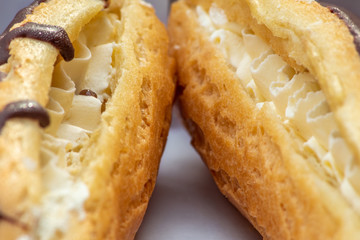 Two Chocolate Eclairs with Cream, Close Up