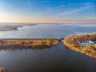 The aerial view of the reservoir and the dam near Minsk, Belarus. Drone aerial photo