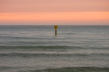 Fototapeta premium Baltic sea coast, Poland, special mark (sea mark) indicating underwater rocks