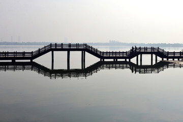 Bridge on a calm foggy morning.