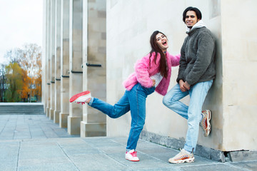 young happy students teenagers at university building on stairs, lifestyle people concept boy and girl