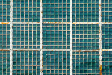 Old wall made of glass blocks. Abstract background for the project and design.