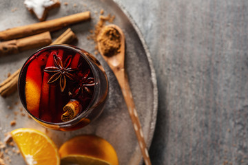 Mulled wine in glass with cinnammon