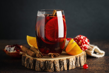 Mulled wine in glass with cinnammon