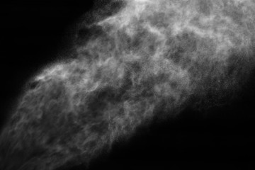 A stream of water and a cloud of drops