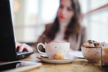 Girl eating coffee cakes