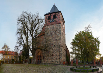 Saint Mary Church of Strasburg Uckermark within Vorpommern-Greifswald district in Germany, built from field stones and half-timbering with bricks, blue sky, copy space