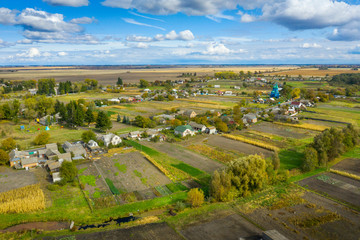 Obraz premium aerial view to traditional Ukrainian village in autumn day