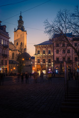 The Archcathedral Basilica of the Assumption of the Blessed Virgin Mary Bell Tower at twilight, Latin Cathedral, night at Rynok Square in Lviv, Ukraine