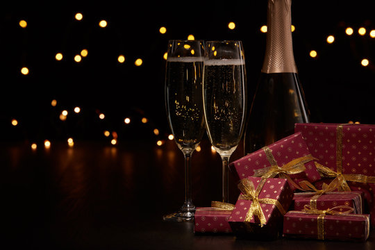 Champagne and gift boxes.  Christmas