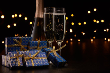 Champagne and gift boxes.  Christmas