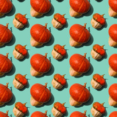 Seamless pattern with decorative ugly pumpkins on biscay green, mint, turquoise