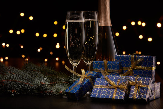 Champagne and gift boxes.  Christmas