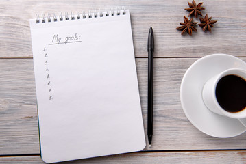 bright male banner / header with a stylish male workspace with laptop, smartphone, modern men's accessories on a wooden table, top view / flat lay