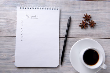 bright male banner / header with a stylish male workspace with laptop, smartphone, modern men's accessories on a wooden table, top view / flat lay