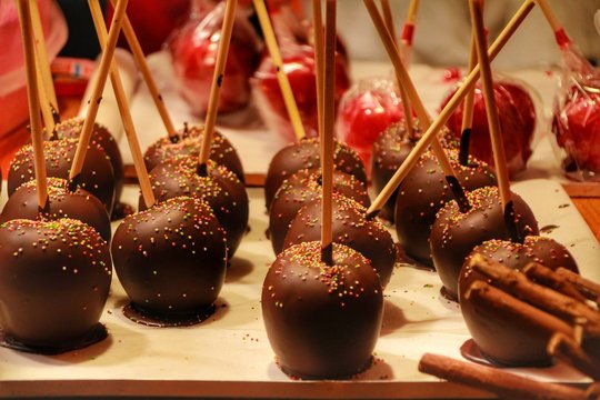 Chocolate dipped apples at a street stall