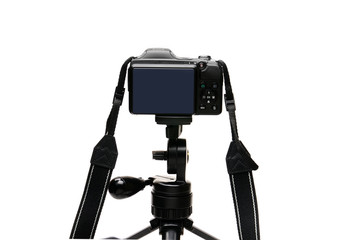 Digital photo camera on a white background