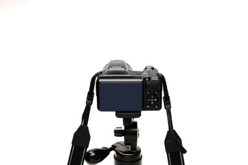 Digital photo camera on a white background