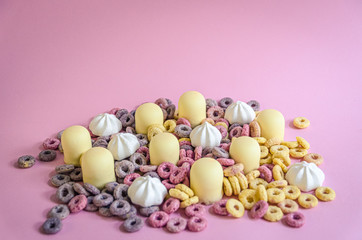 Fototapeta na wymiar A delicious pile of sweets marshmallows cereal and meringue